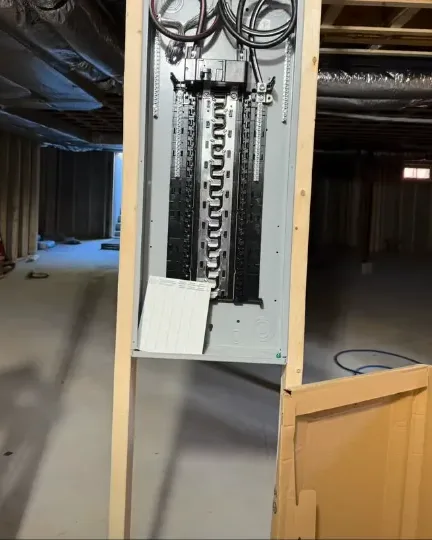 New electrical panel in a framed wall