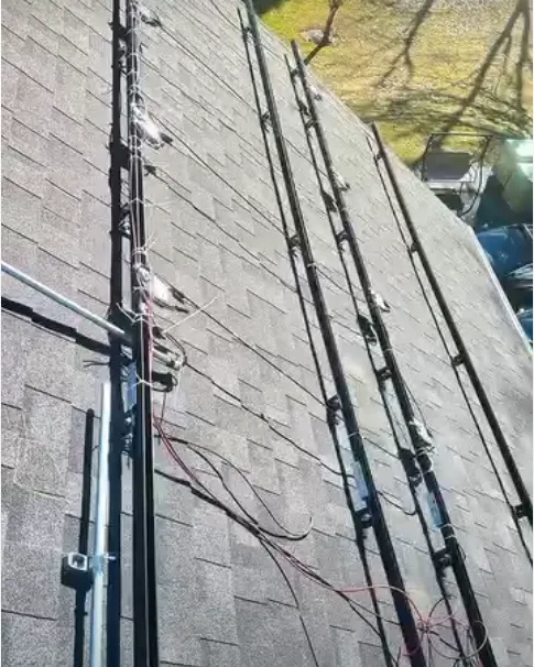 Solar racking rails mounted on a shingle roof in Methuen