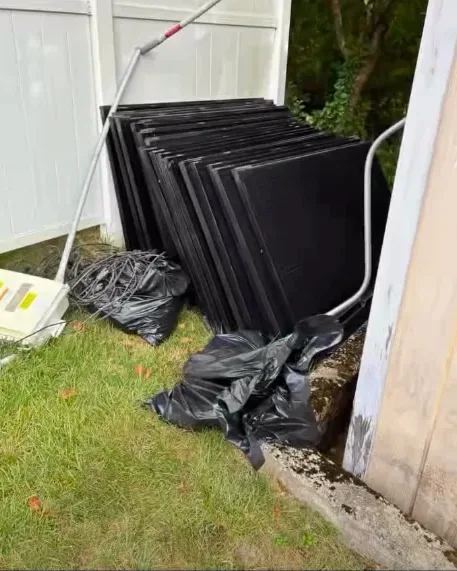 Stack of removed solar panels