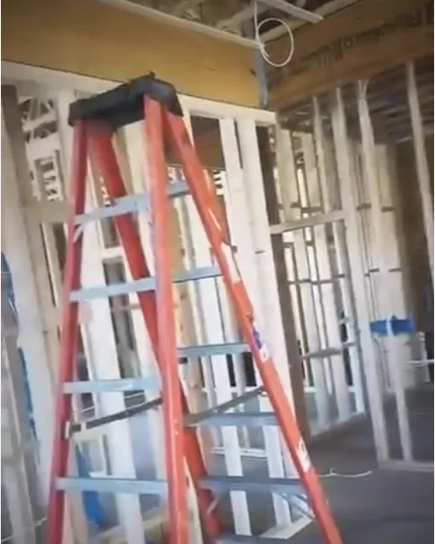 Ladder and framing during an electrical rough-in